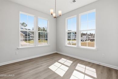 The single-story Bates II plan features three bedrooms and two - photo 8