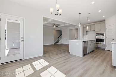 The single-story Bates II plan features three bedrooms and two - photo 9