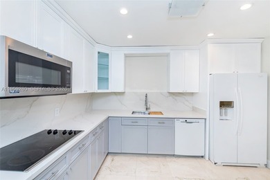 Remodeled 4-bedroom, 2-bath custom-built home featuring an open - photo 11