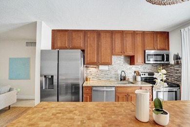 RARELY AVAILABLE sophisticated 1st floor residence in the highly - photo 11