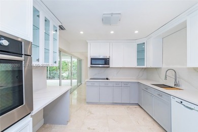 Remodeled 4-bedroom, 2-bath custom-built home featuring an open - photo 12