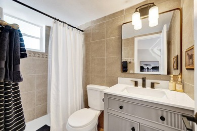 RARELY AVAILABLE sophisticated 1st floor residence in the highly - photo 13