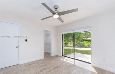 Remodeled 4-bedroom, 2-bath custom-built home featuring an open - photo 16
