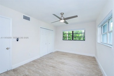 Remodeled 4-bedroom, 2-bath custom-built home featuring an open - photo 17