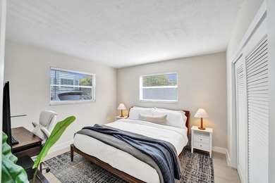 RARELY AVAILABLE sophisticated 1st floor residence in the highly - photo 20