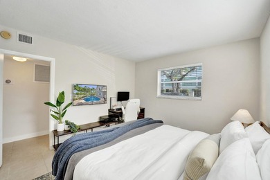 RARELY AVAILABLE sophisticated 1st floor residence in the highly - photo 21