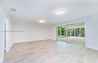 Remodeled 4-bedroom, 2-bath custom-built home featuring an open - photo 22