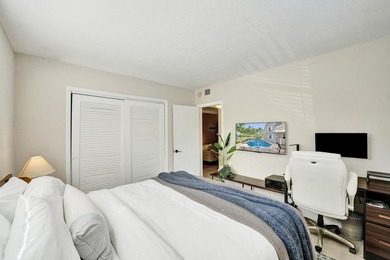 RARELY AVAILABLE sophisticated 1st floor residence in the highly - photo 22