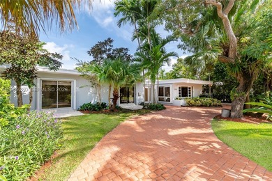 Remodeled 4-bedroom, 2-bath custom-built home featuring an open - photo 24