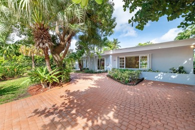 Remodeled 4-bedroom, 2-bath custom-built home featuring an open - photo 25