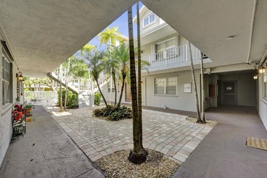 RARELY AVAILABLE sophisticated 1st floor residence in the highly - photo 27