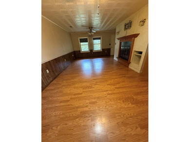 This home offers a Large living room with a fireplace for those