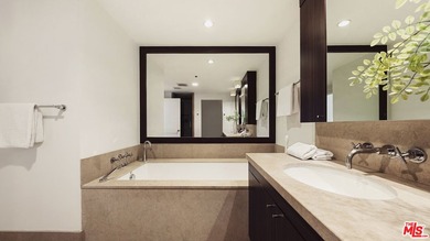 Premier penthouse living just four blocks from the beach and - photo 12
