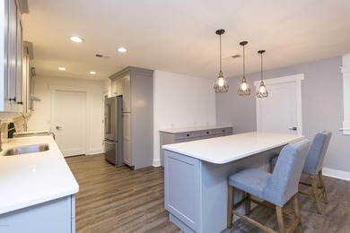 This lovely 3 bedroom, 2 bath home is located in the highly - photo 3