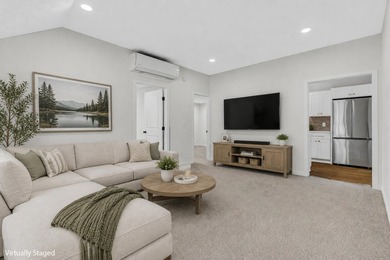 Enjoy views of Bostwick Lake from this completely updated home - photo 13