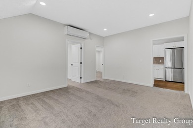 Enjoy views of Bostwick Lake from this completely updated home - photo 14