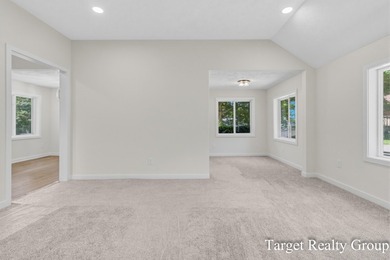 Enjoy views of Bostwick Lake from this completely updated home - photo 16
