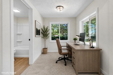 Enjoy views of Bostwick Lake from this completely updated home - photo 17