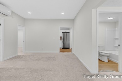 Enjoy views of Bostwick Lake from this completely updated home - photo 18