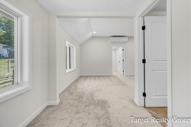 Enjoy views of Bostwick Lake from this completely updated home - photo 20