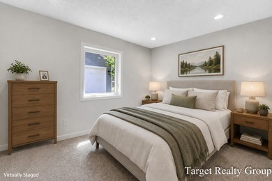 Enjoy views of Bostwick Lake from this completely updated home - photo 23