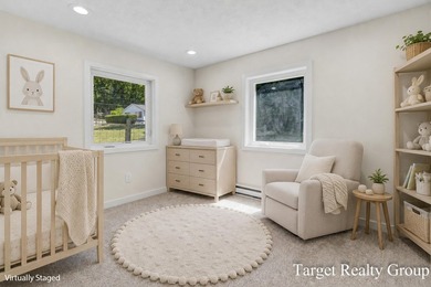 Enjoy views of Bostwick Lake from this completely updated home - photo 26