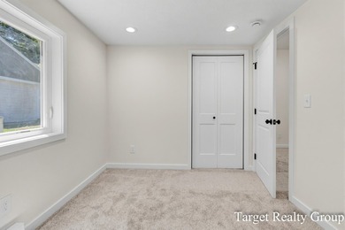 Enjoy views of Bostwick Lake from this completely updated home - photo 28