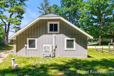 Enjoy views of Bostwick Lake from this completely updated home - photo 31