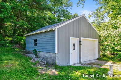 Enjoy views of Bostwick Lake from this completely updated home - photo 33