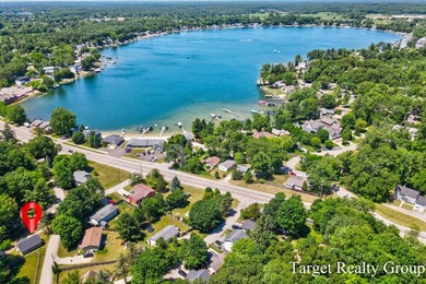 Enjoy views of Bostwick Lake from this completely updated home - photo 34