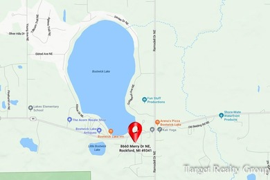 Enjoy views of Bostwick Lake from this completely updated home - photo 35