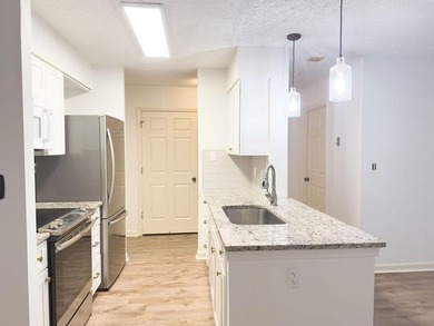 Welcome to this beautiful 3rd-floor condo in the prestigious 55+