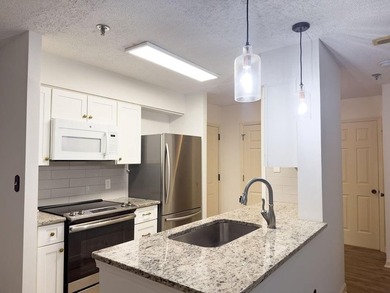 Welcome to this beautiful 3rd-floor condo in the prestigious 55+