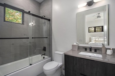 This newly constructed, architecturally designed home offers a - photo 28
