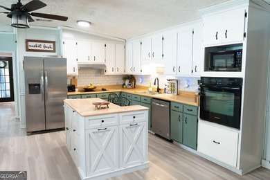 Wake up to peaceful waterfront views and spend your evenings on - photo 3