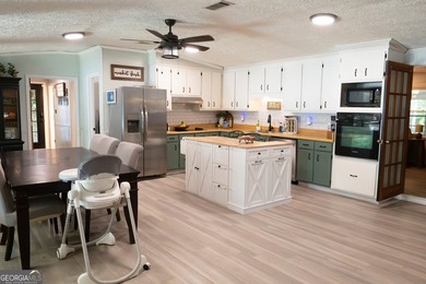 Wake up to peaceful waterfront views and spend your evenings on - photo 5
