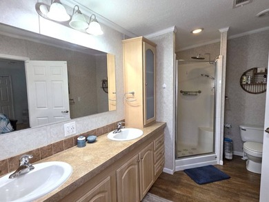 THIS HOME IS ON LEASED LAND WITH A MONTHLY LOT RENT OF $517 AND - photo 50