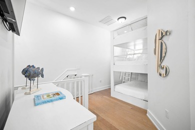 Sleeping up to 10 guests, 62 Charming Way offers two bedrooms - photo 13