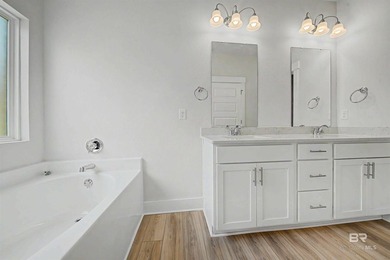 Welcome home! This like-new 4BR/2BA Gold Fortified brick home in - photo 17