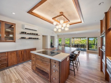 Situated on two privately fenced and gated acres in Haiku - photo 18