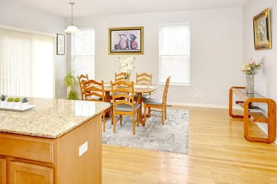 Light-filled and beautifully maintained, this move-in-ready - photo 2