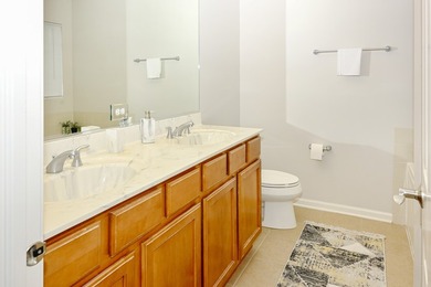 Light-filled and beautifully maintained, this move-in-ready - photo 8