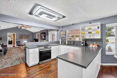 Welcome to 8620 San Servera Drive W, a beautifully updated - photo 14