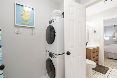 Enjoy coastal charm in this beautifully decorated 1 bed, 1.5 - photo 16