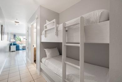 Enjoy coastal charm in this beautifully decorated 1 bed, 1.5 - photo 18