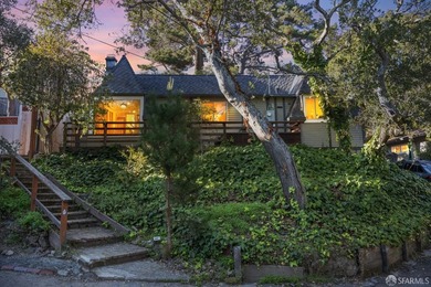 Perched above the street, this charming alpine-style cabin - photo 1
