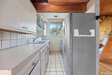 Perched above the street, this charming alpine-style cabin - photo 6