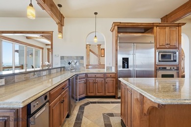 Perched above the Gallatin River with commanding, unobstructed - photo 12