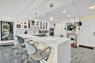 One of the finest three-bedroom waterfront residences in - photo 7