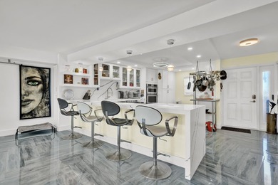One of the finest three-bedroom waterfront residences in - photo 9